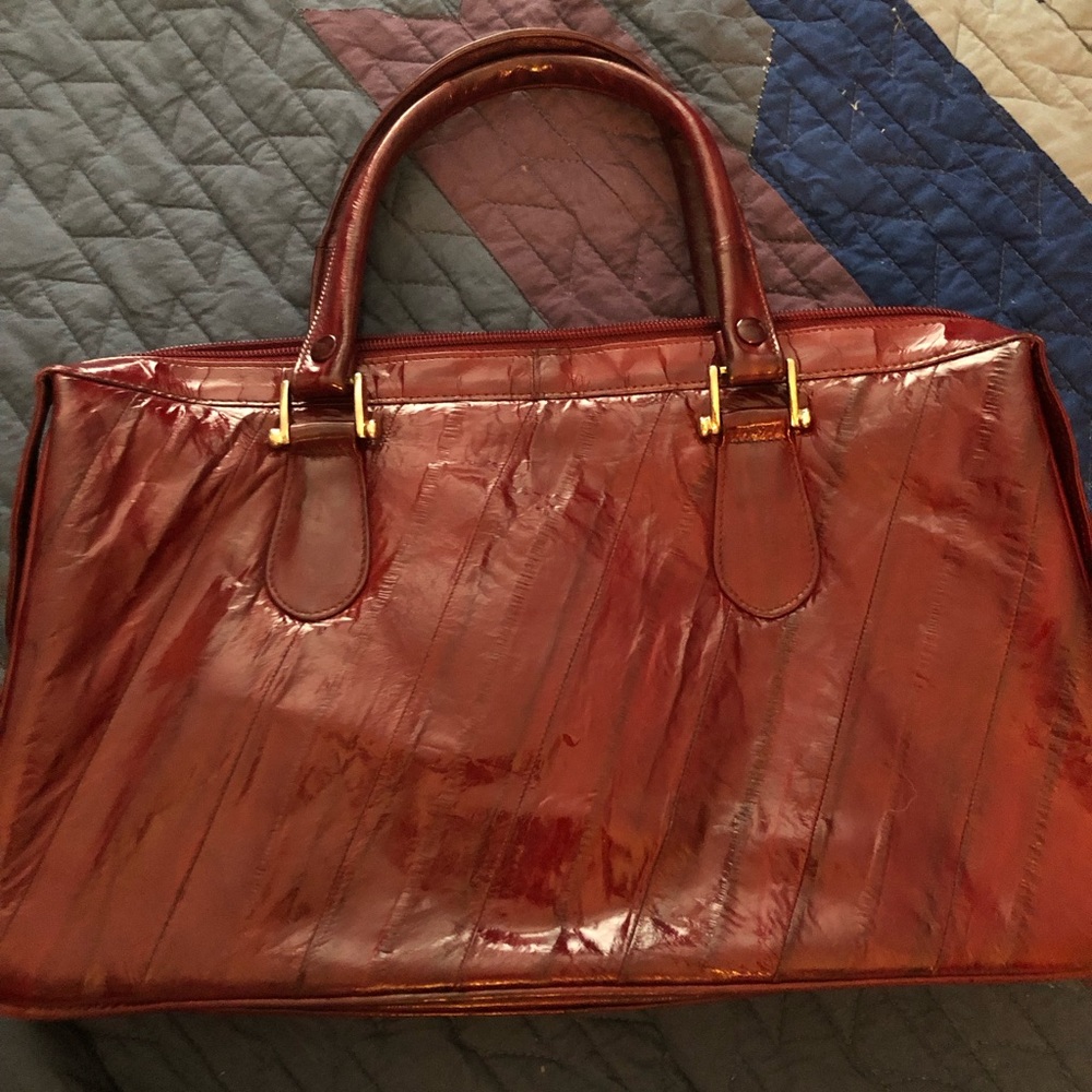 Vintage Genuine Eelskin purse 7.5 by 12 inches lots of internal compartments